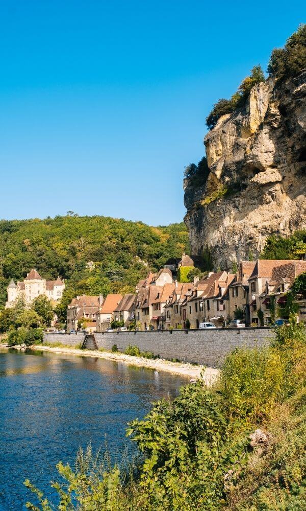 La Roque Gageac with blue skye and the river