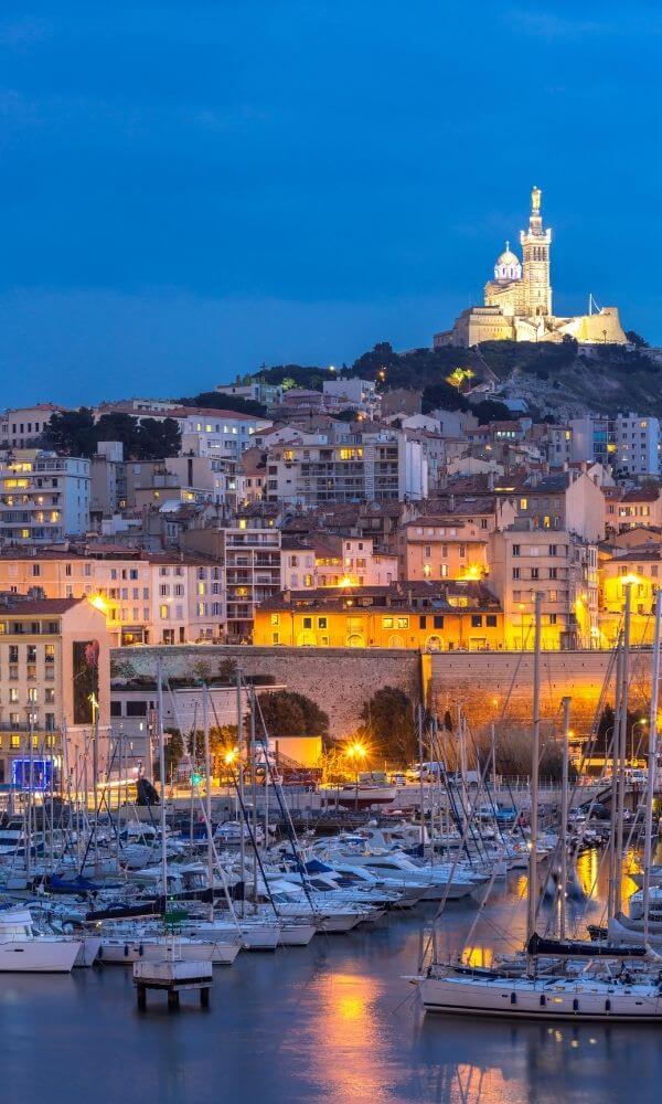 Boats parked at the pier of Marseille at night in the South of France in October