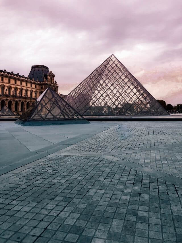 Louvre Museum Pyramide at dust