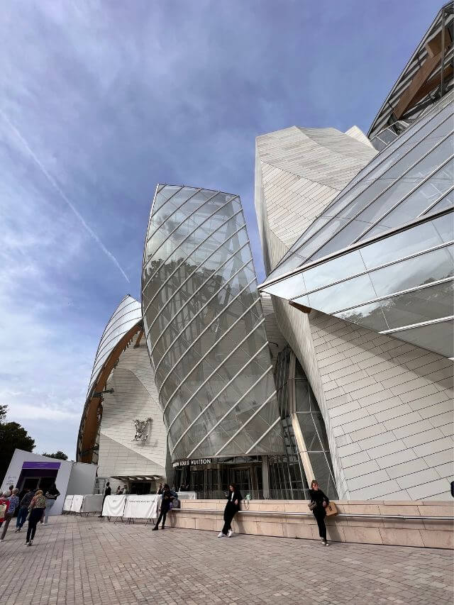 unique architecture filled with windows of the Louis Vuitton Museum, a fashion museum in paris