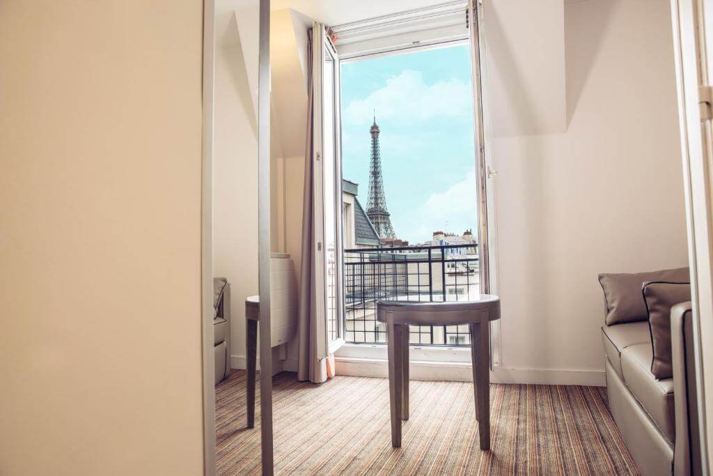 Hotel room with view of Eiffel tower