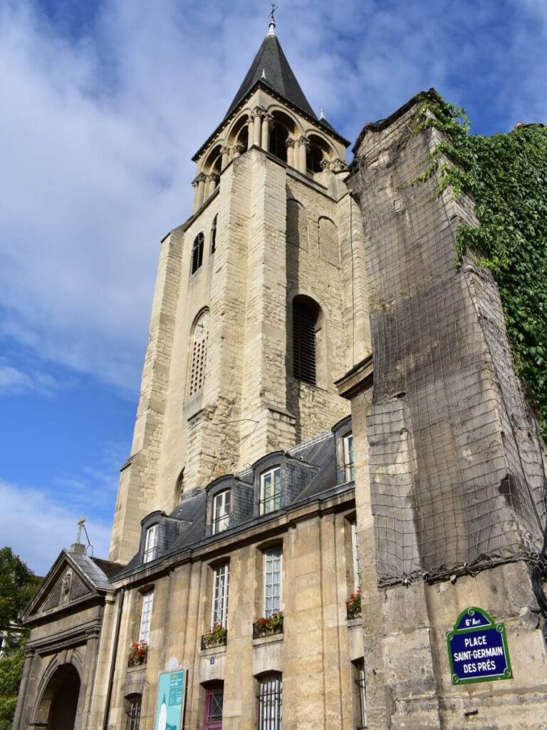 The Saint Germain des Pres Church with the street name in the morning of September in Paris