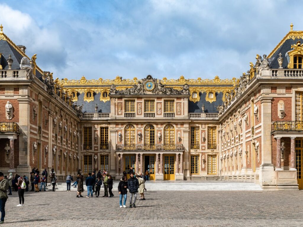 Palace of Versailles Front with people visiting before Paris in winter